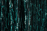 Fabric with shiny green sequins 