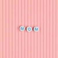 MOM beads text typography on pink