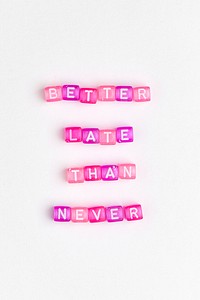 BETTER LATE THAN NEVER beads message typography