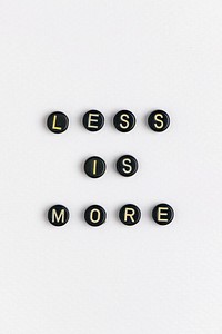 LESS IS MORE beads word typography