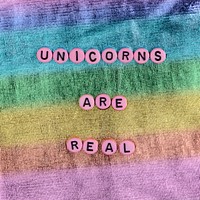 Pink UNICORNS ARE REAL beads message typography