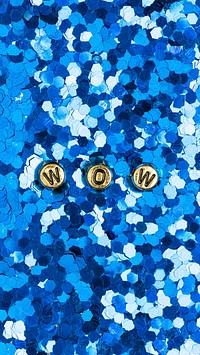 WOW beads text typography on blue glitter