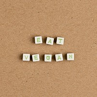 EAT VEGAN beads message typography