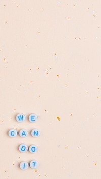 WE CAN DO IT beads text typography on a copy space
