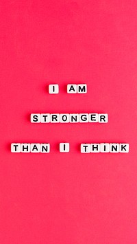 I AM STRONGER THAN I THINK square beads message typography on red background