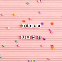 White HELLO JUNE beads message typography