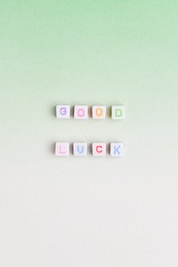 Colorful GOOD LUCK beads text typography