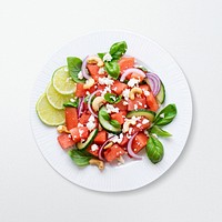 Psd watermelon salad with basil, mint, red onion, cucumber and cashew nuts