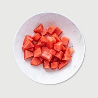 Psd chopped watermelon in white plate with fork