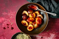 Roasted plums with brown sugar top view