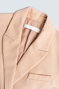 Pink blazer with blank clothing label casual wear fashion