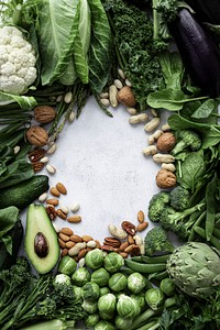 Green vegetable and nuts frame food photography