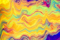 Yellow liquid marble background handmade colorful flowing texture experimental art