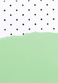 Green background with black polka dot pattern