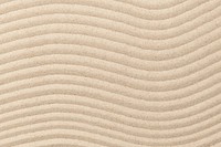 Zen sand wave textured background in wellness concept