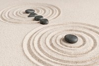Zen stones sand background health and wellness concept