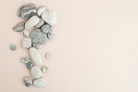 Marble zen stones stacked on beige background in mindfulness concept