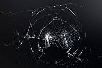 Black cracked background with broken glass texture