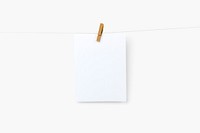 Blank photos hanging by wooden clip