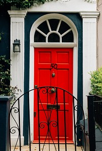 Bright red door entrance to a house
