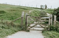 Uphill walkway with wooden gates