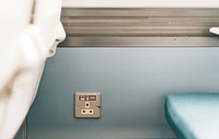 Electric supply socket in a train