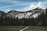 Contrails over the blue sky in Yosemite National Park, California