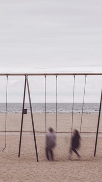 Public swing on the beach mobile screen wallpaper