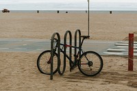 Bike locked with a rack on a coast