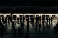 People waiting for a train on a platform