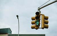 Green traffic light above the intersection