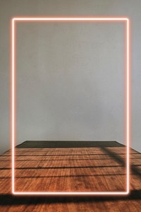 Wooden table with a pink frame mockup