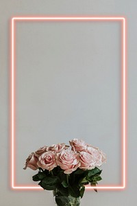 Beautiful pink roses in a vase on a table