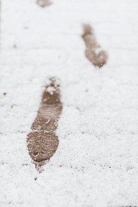 Footsteps on an icy road background