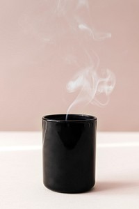 Steaming black coffee cup