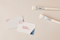 Design branding company card and paintbrushes mockup