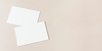 Blank business cards on beige social banner