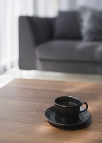 Free black coffee cup top view on wooden table background photo, public domain beverage CC0 image.