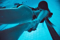 Free couple swimming underwater image, public domain love CC0 photo.