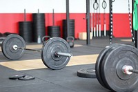 Free weight bar with plates on image, public domain fitness CC0 photo.