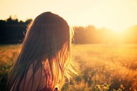 Free girl on field during sunset image, public domain nature CC0 photo.