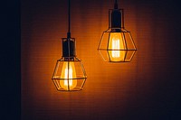 Free glowing orange light bulbs image, public domain interior design CC0 photo.