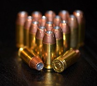 Bullet closeup, weapon photo, free public domain CC0 image.