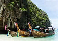 Free wooden boat at the beach image, public domain CC0 photo.