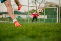 Free men playing a soccer game on field image, public domain sport CC0 photo.