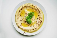 Free top down hummus on white plate image, public domain food CC0 photo.