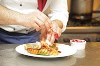 Chef decorating his dish image, free public domain CC0 photo.