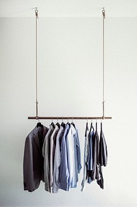 Free wooden closet rod, hanging clothes image, public domain room CC0 photo.