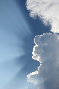 Sun behind cloud, free public domain CC0 image.