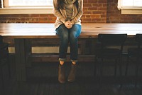 Girl sitting in classroom, free public domain CC0 image.